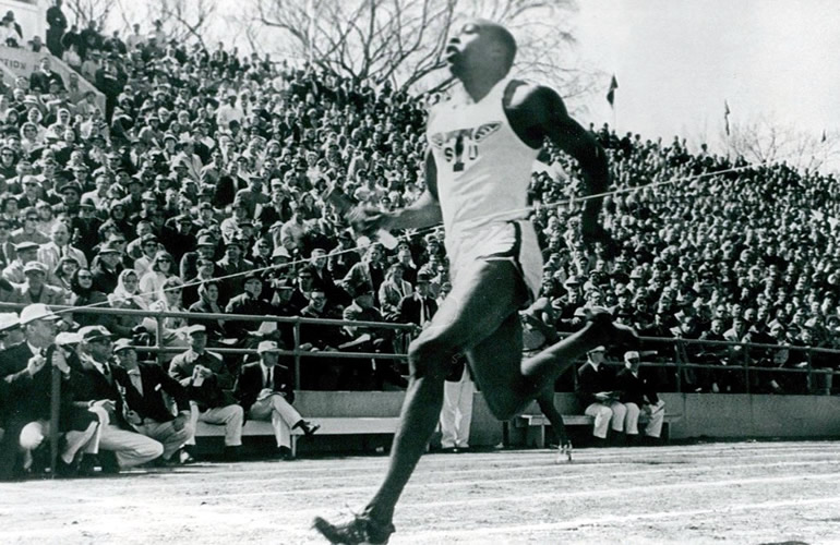 Image of American 100m sprinter Jim Hines.