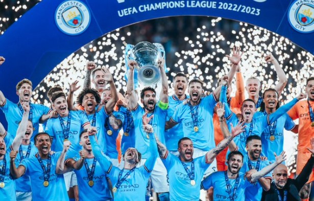 Image of Manchester City winning the 2023 Champions League trophy.