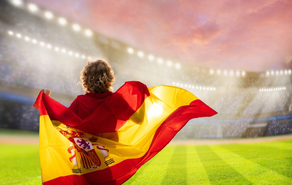 Image of football fan with Spanish flag.