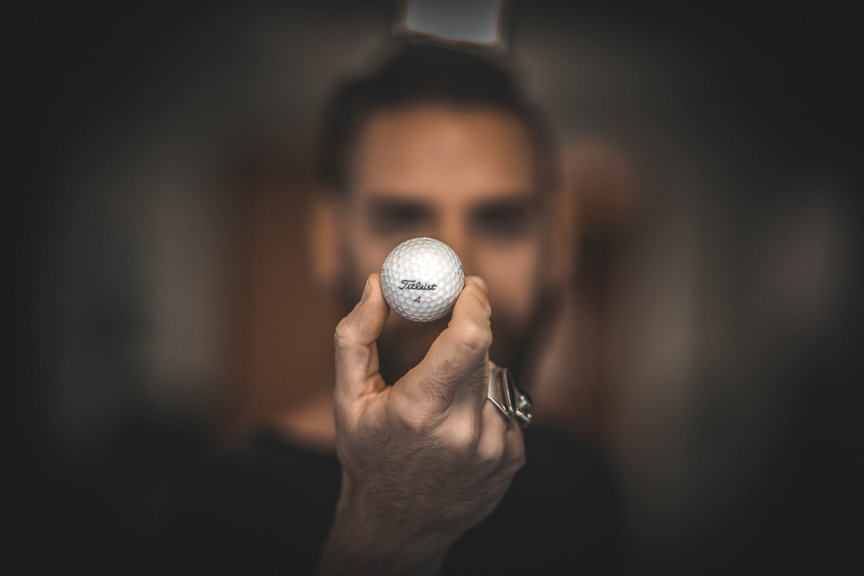 Man holding a golf ball