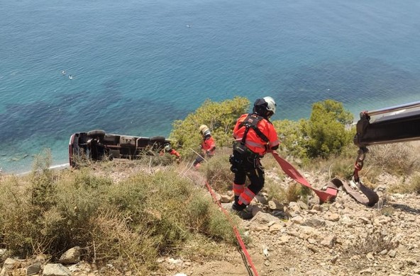 Image of a van that fell down a slope at Maro cliffs in Nerja.