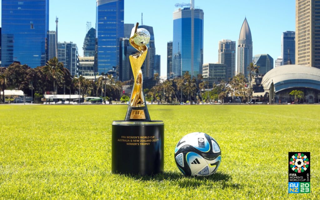 Women's World Cup trophy and official football.