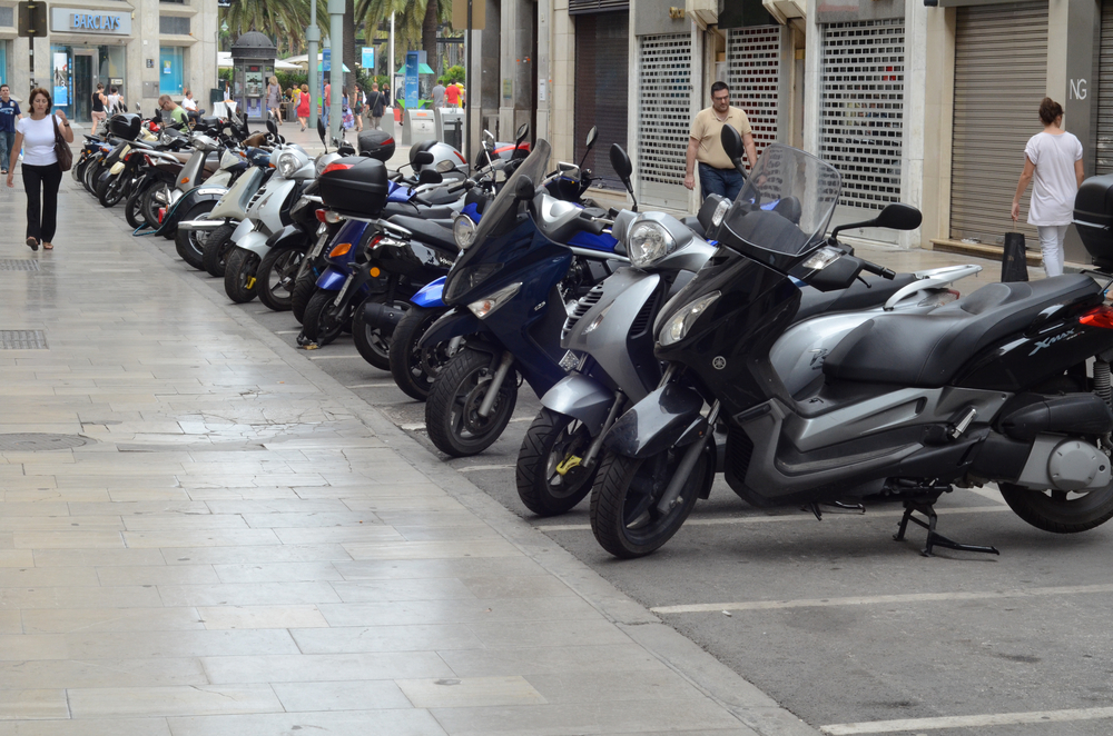 Image of mopeds parked in Malaga.