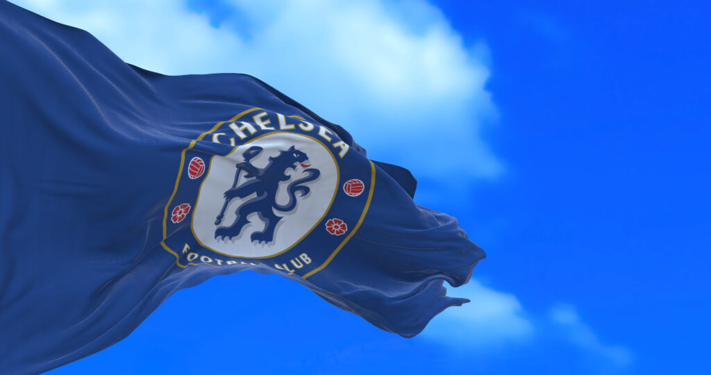 A Chelsea flag blowing in the wind.