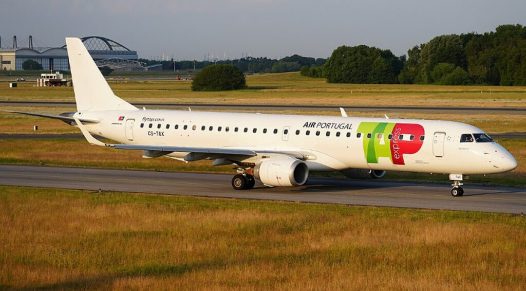 Image of TAP airlines plane at Hamburg Airport.