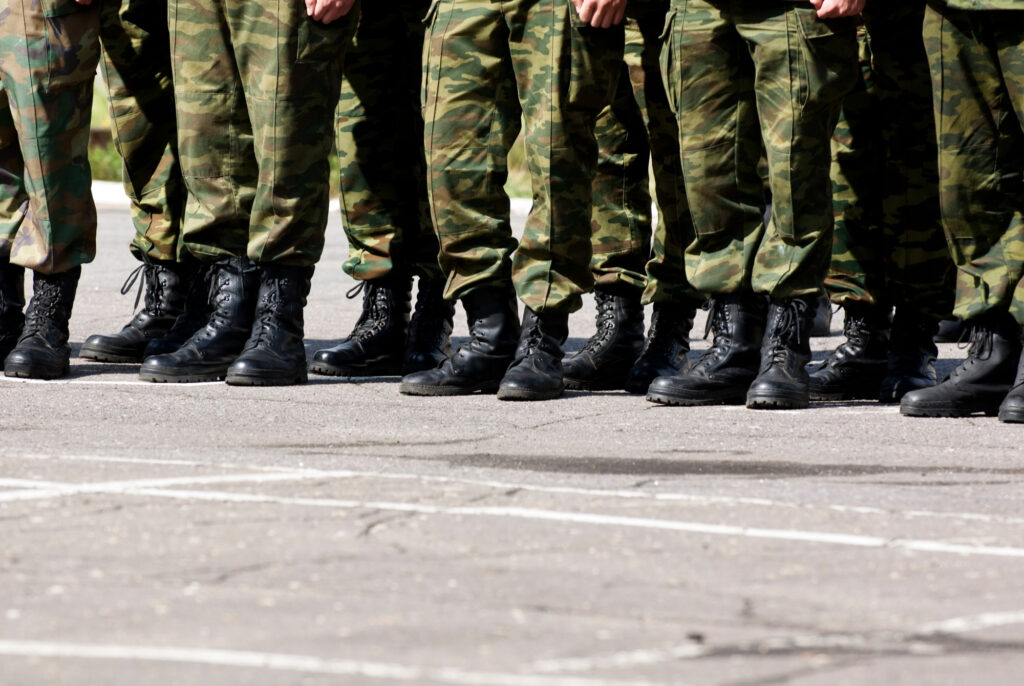 lower legs of military personnel on parade