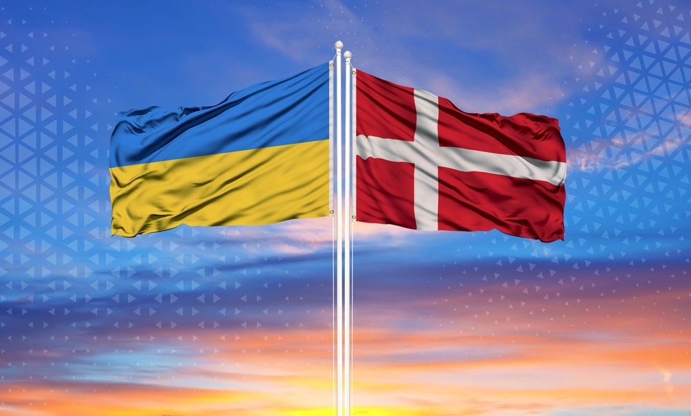Ukraine,And,Denmark,Two,Flags,On,Flagpoles,And,Blue,Sky Denmark Bolsters Ukraine's Defence