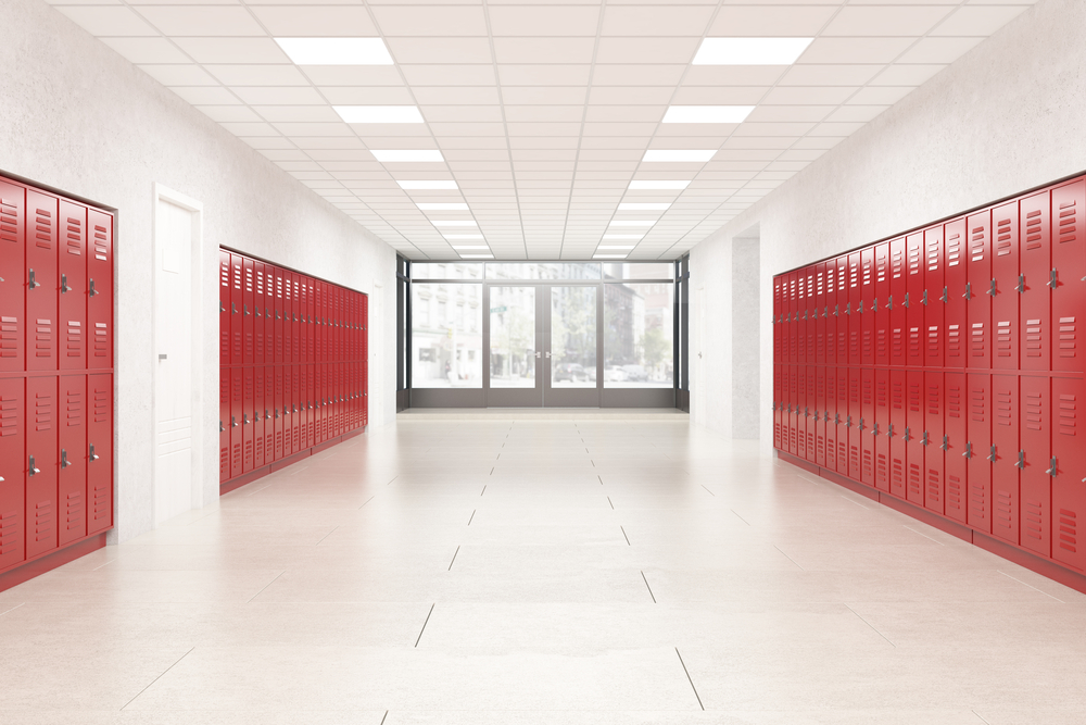 View of a school entrance with red lockers