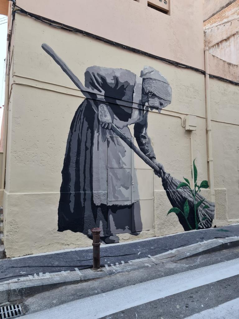 Brooming art: Alicante's newest mural sweeps in community spirit.