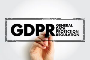 GDPR breach compensation: The essential guide to your claim Euro Weekly News hand in background writing the word GDPR