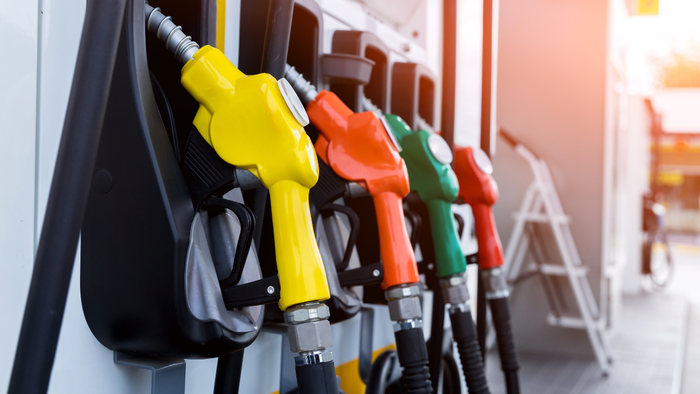 Fuel pump nozzles at a gas station
