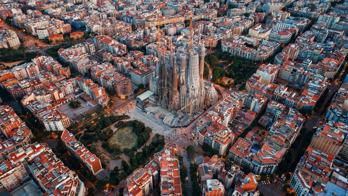 Aerial view of Barcelona’s Eixample district with the Sagrada Família in the centre.