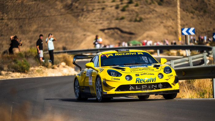 The winners car races through Almeria's winding roads.