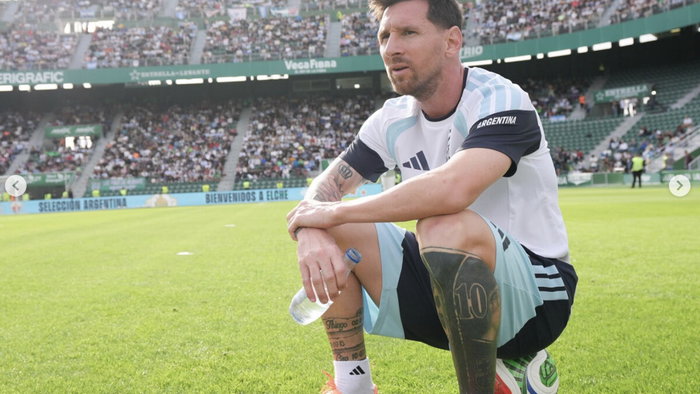 Lionel Messi sitting in the Elche CF Stadium, taking in the views of all of the fans