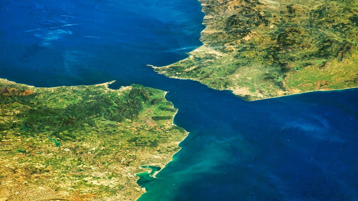 Aerial view of the Strait of Gibraltar between Spain and Morocco, highlighting new scientific research suggesting it may eventually disappear.