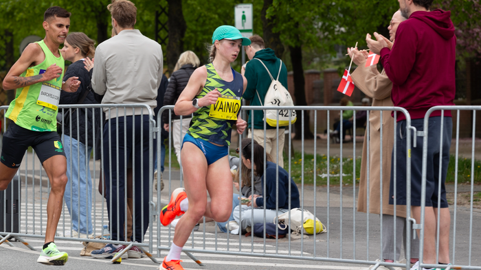 Man and a woman running a Marathon