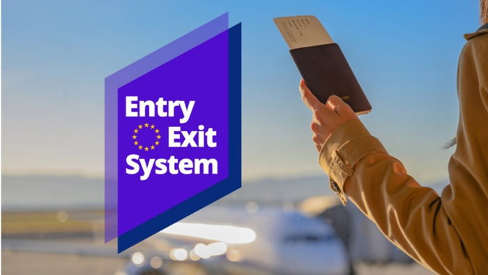 EU Entry/Exit System logo with traveller holding a passport at a border crossing