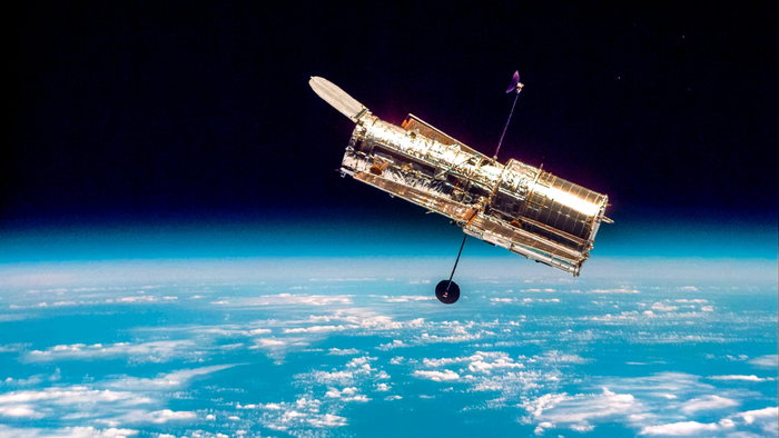 Hubble telescope orbiting earth