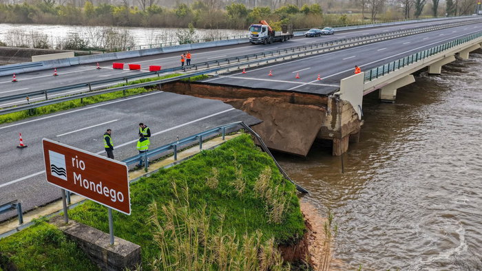 Collapsed section of Portugal’s A1 motorway near Coimbra after intense rainfall and dike failure