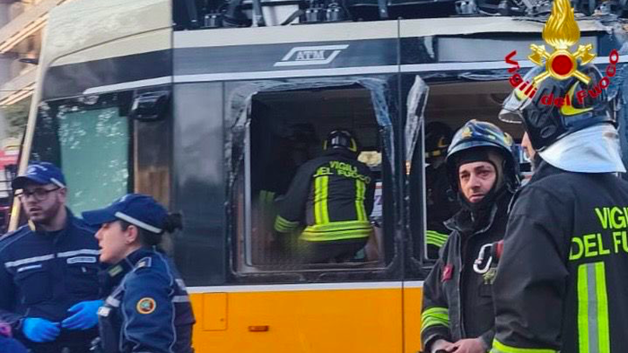 Fire brigade attending a crashed tram.
