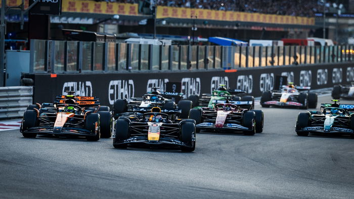 Formula 1 cars racing on a track