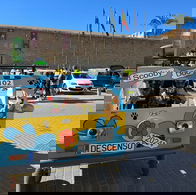 A handmade race card made to look like Scooby Doo's Mystery Machine races in Cuevas del Almanzora