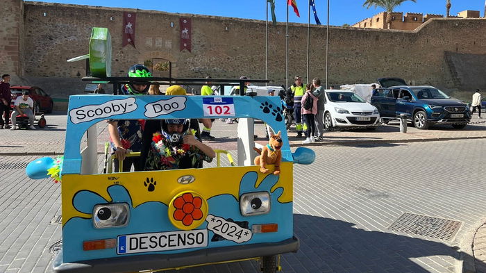 A handmade race card made to look like Scooby Doo's Mystery Machine races in Cuevas del Almanzora