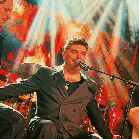 Dentists working on a young boys mouth