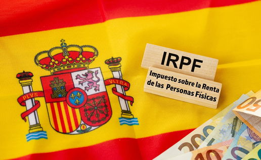 Spain IRPF income tax concept with Spanish flag and euro banknotes