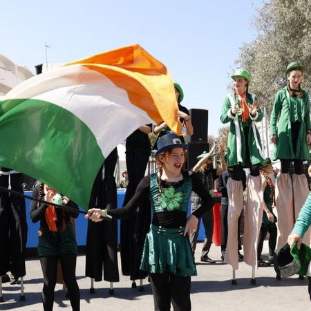 V16 emergency warning light flashing on top of a car stopped on the roadside in Spain.