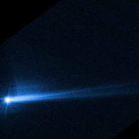 Image showing debris plume from NASA’s DART spacecraft impact with asteroid Dimorphos.
