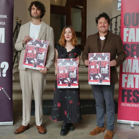 Dentists working on a young boys mouth