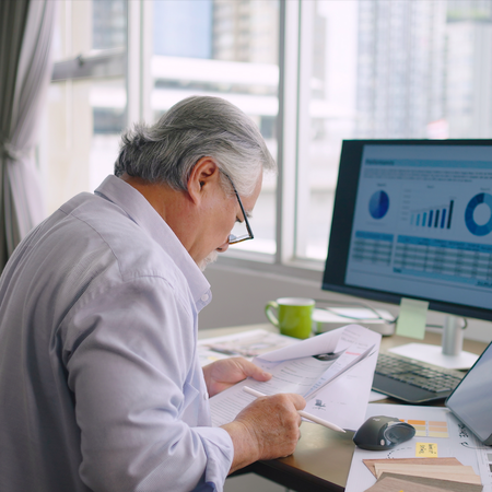 Senior man working at a desk