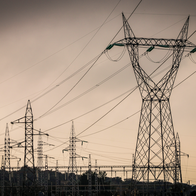 Electricity pylons at sunset
