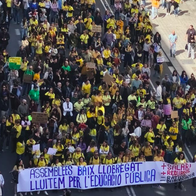 A street filled with people protesting.