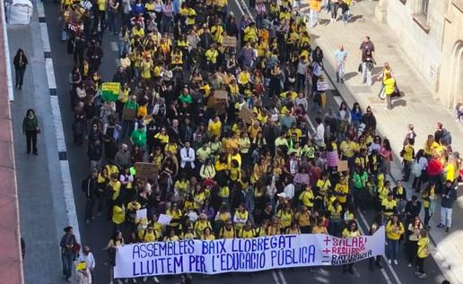A street filled with people protesting.