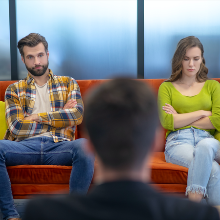 Couple sitting in front of a mediator