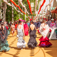 Young ladies dressed in Flamenco dresses in Sevilla