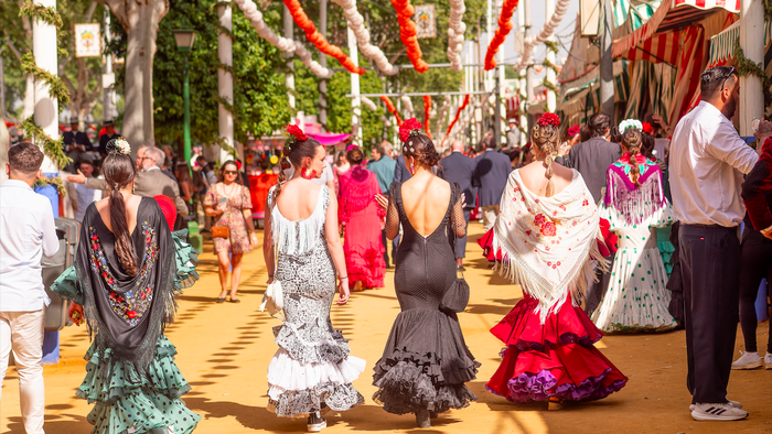 Young ladies dressed in Flamenco dresses in Sevilla