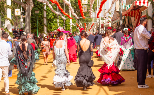 Young ladies dressed in Flamenco dresses in Sevilla