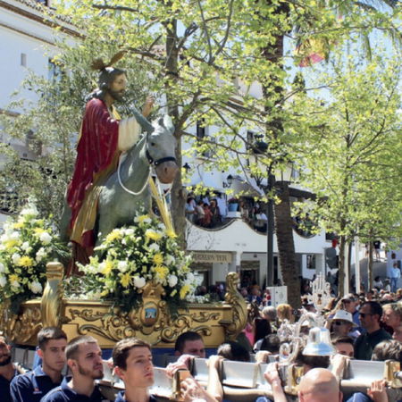 Person using a calculator to manage expenses in Spain despite rising average salaries