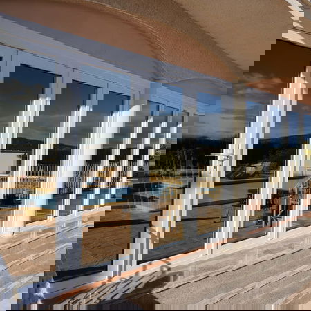 Bi-Fold Plegable Door