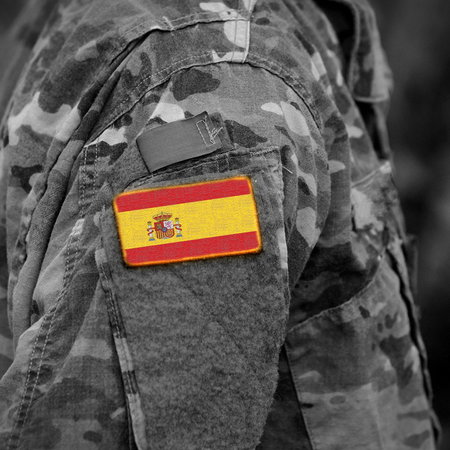 Spanish soldier uniform with Spain flag patch, representing military personnel and early retirement plans
