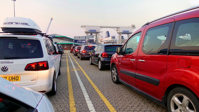 Cars queue at a busy ferry port as passengers face potential delays due to new EU border checks