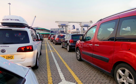 Cars queue at a busy ferry port as passengers face potential delays due to new EU border checks