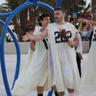 Performers acting as athletes during comedy Olympics show in Lo Pagan park