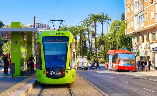 Public bus operating in Murcia city centre during holiday period