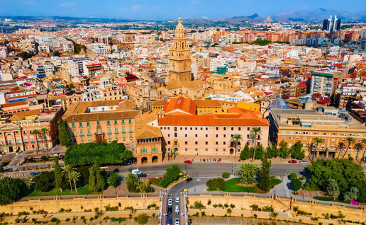 General view of Murcia city with residential buildings and urban streets