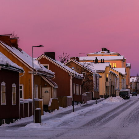 Houses on a quiet Finnish street highlighting real estate amid new foreign ownership restrictions
