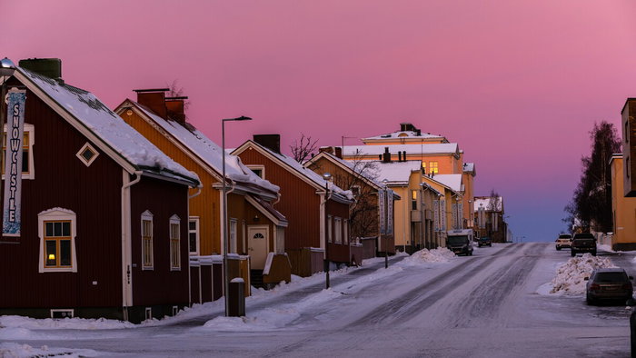 Houses on a quiet Finnish street highlighting real estate amid new foreign ownership restrictions